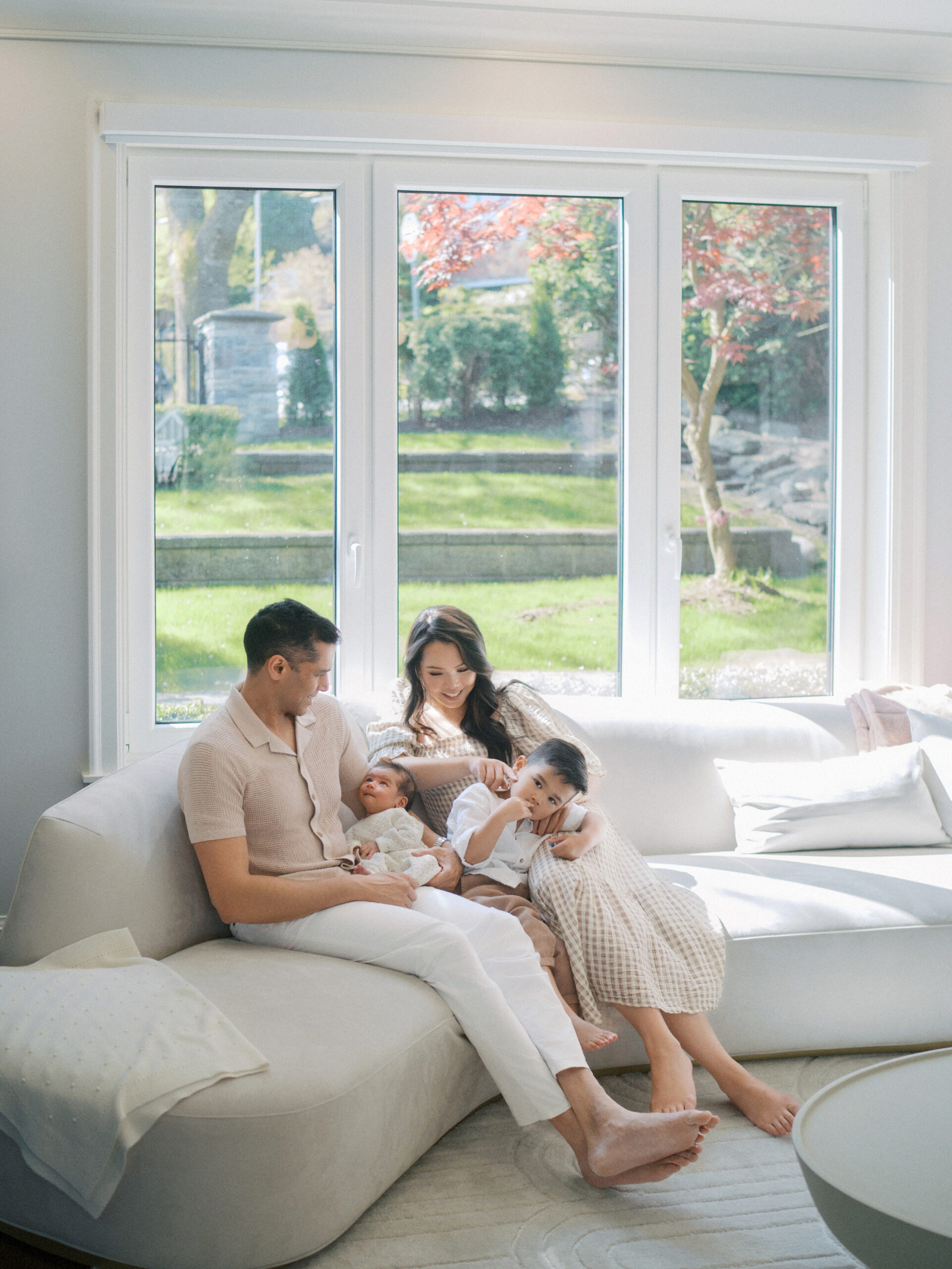 Family of four during an in-home family session